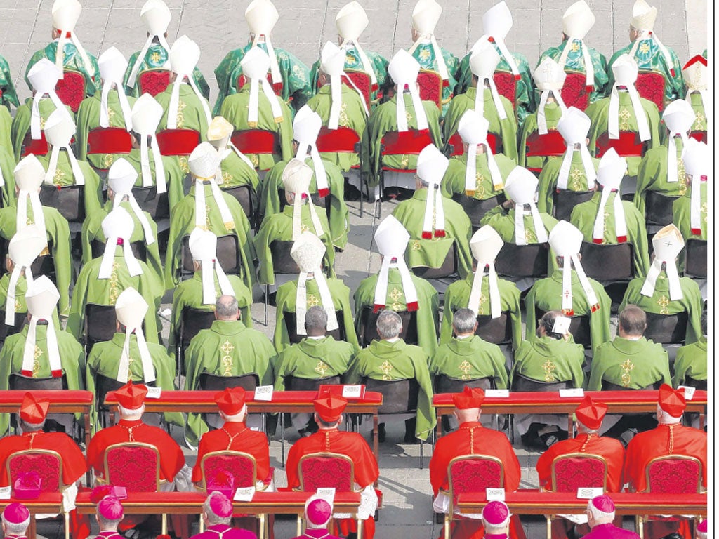 Bishops and cardinals attends a  mass celebrated by Pope Benedict XVI  for the opening of the Synod of bishops 